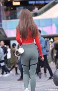 Red slim top with gray yoga pants